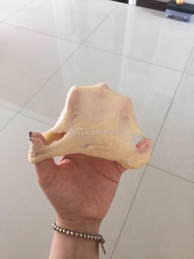 放入黄油，搅拌均匀至扩展阶段，如图。