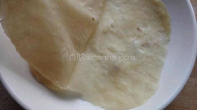 熟了将饼从中间揭开，薄饼就烙好了！