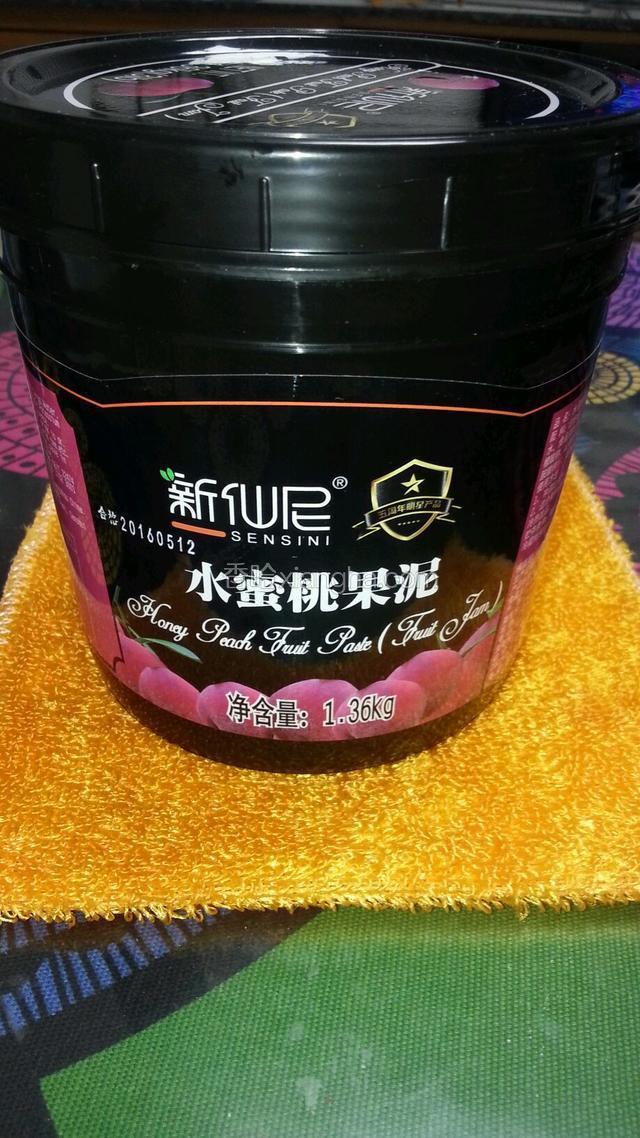 称取水蜜桃果泥100g