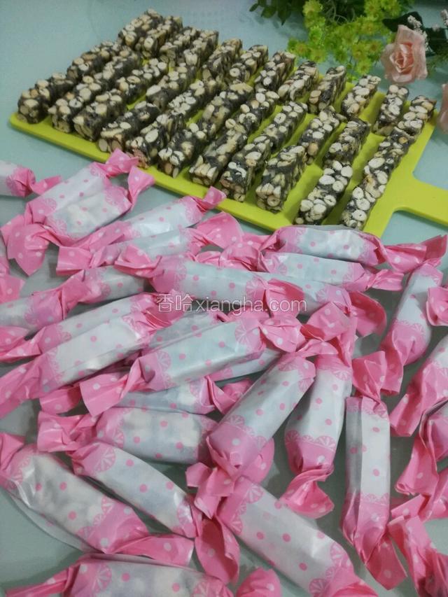 用糯米纸包起来再包糖纸头