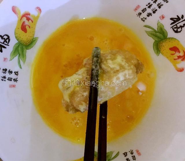 再裹一层鸡蛋液。