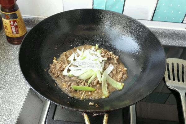 羊肉片炒金针菇的做法图解6