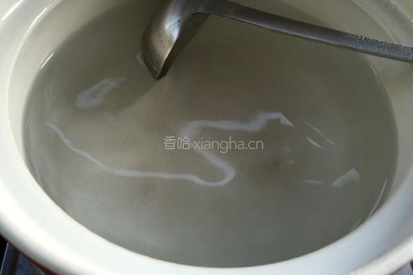 皮蛋火腿粥的做法图解3