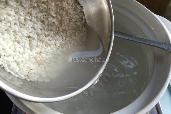 皮蛋火腿粥的做法图解4