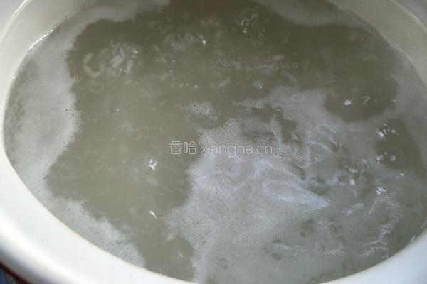 皮蛋火腿粥的做法图解5