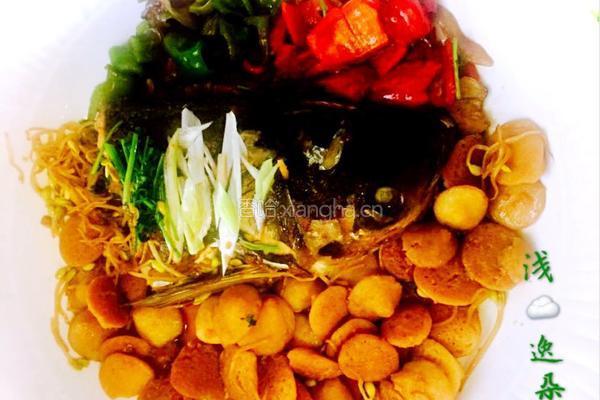 鱼头炖豆饼的做法图解1